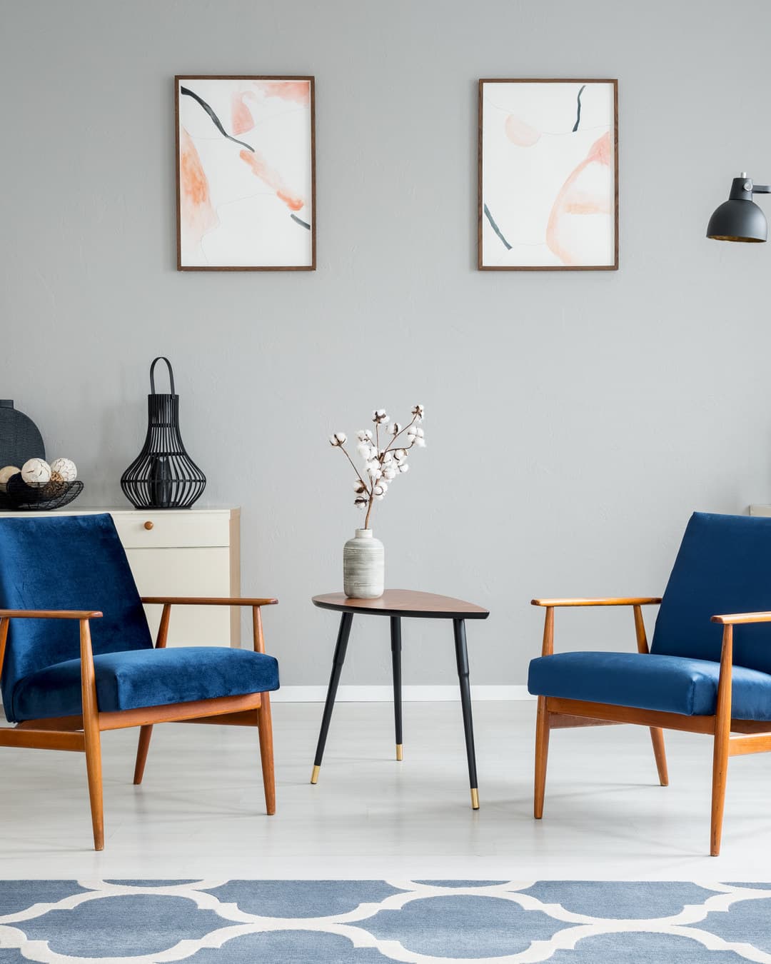 Walnut sideboard with two cane armchairs