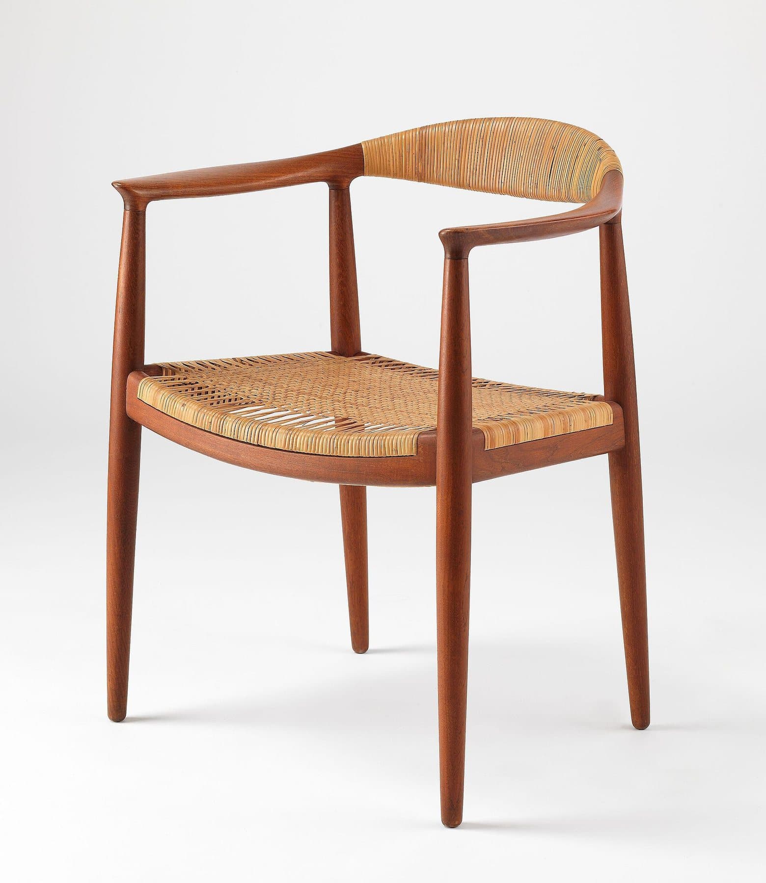 Hans Wegner PP501 Round Chair photographed against a neutral museum background