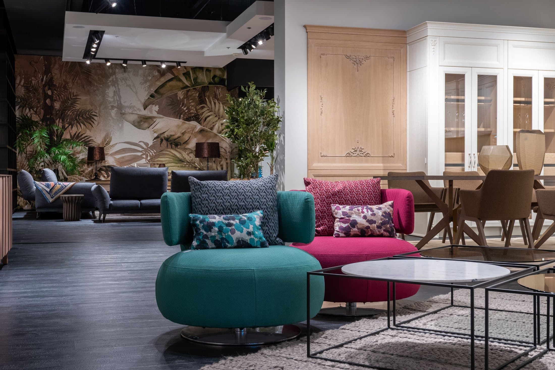 Furniture showroom with several upholstered chairs and sofas